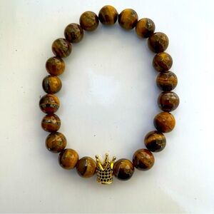 Men’s tigers eye bracelet size can be adjusted